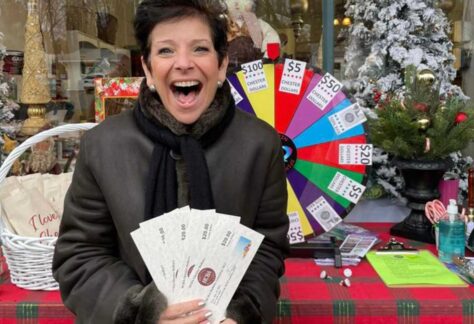 Spin to Win on Main Street in Chester photo, happy winner of Chester Dollars