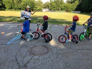 Avenues in Motion kids riding bikes photo